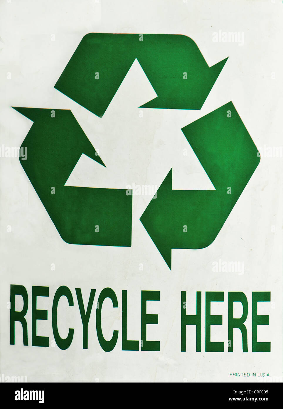 Green recycle here sign on white background Stock Photo