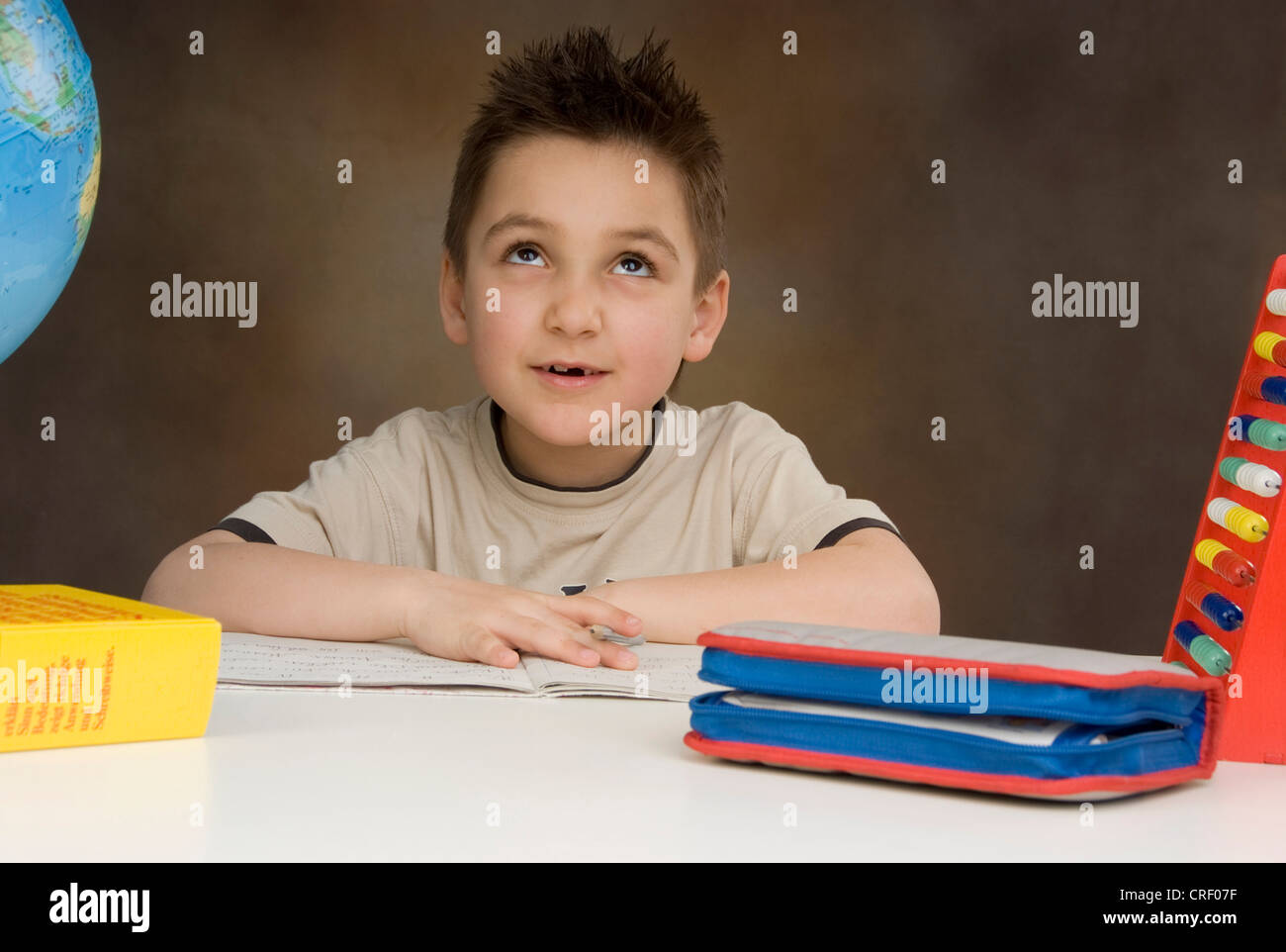 schoolboy learning Stock Photo Alamy