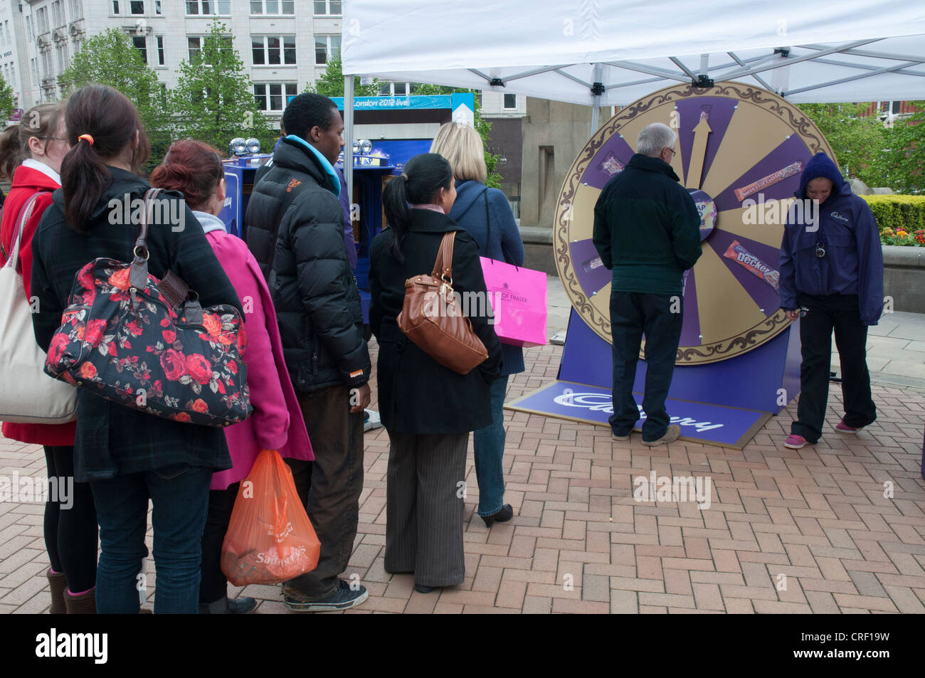 People queueing in Victoria Square, Birmingham, for a chance to win tickets to the 2012 Olympic Games in London Stock Photo