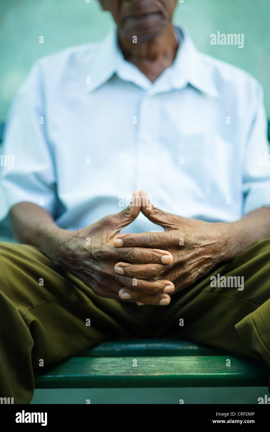 closeup of hands of elderly african american man sitting on bench Stock ...