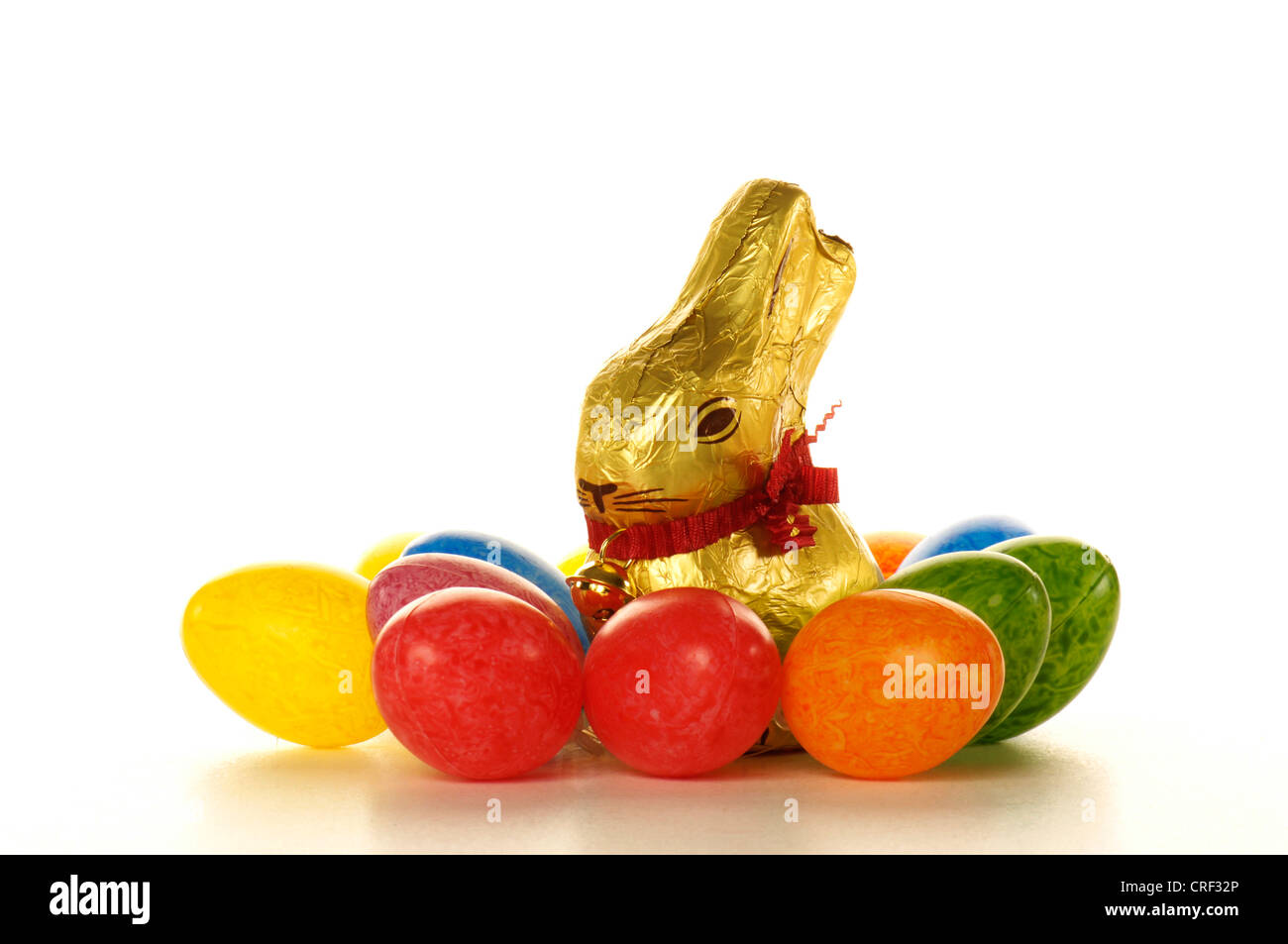 chocolate Easter bunny with coloured  Easter eggs Stock Photo