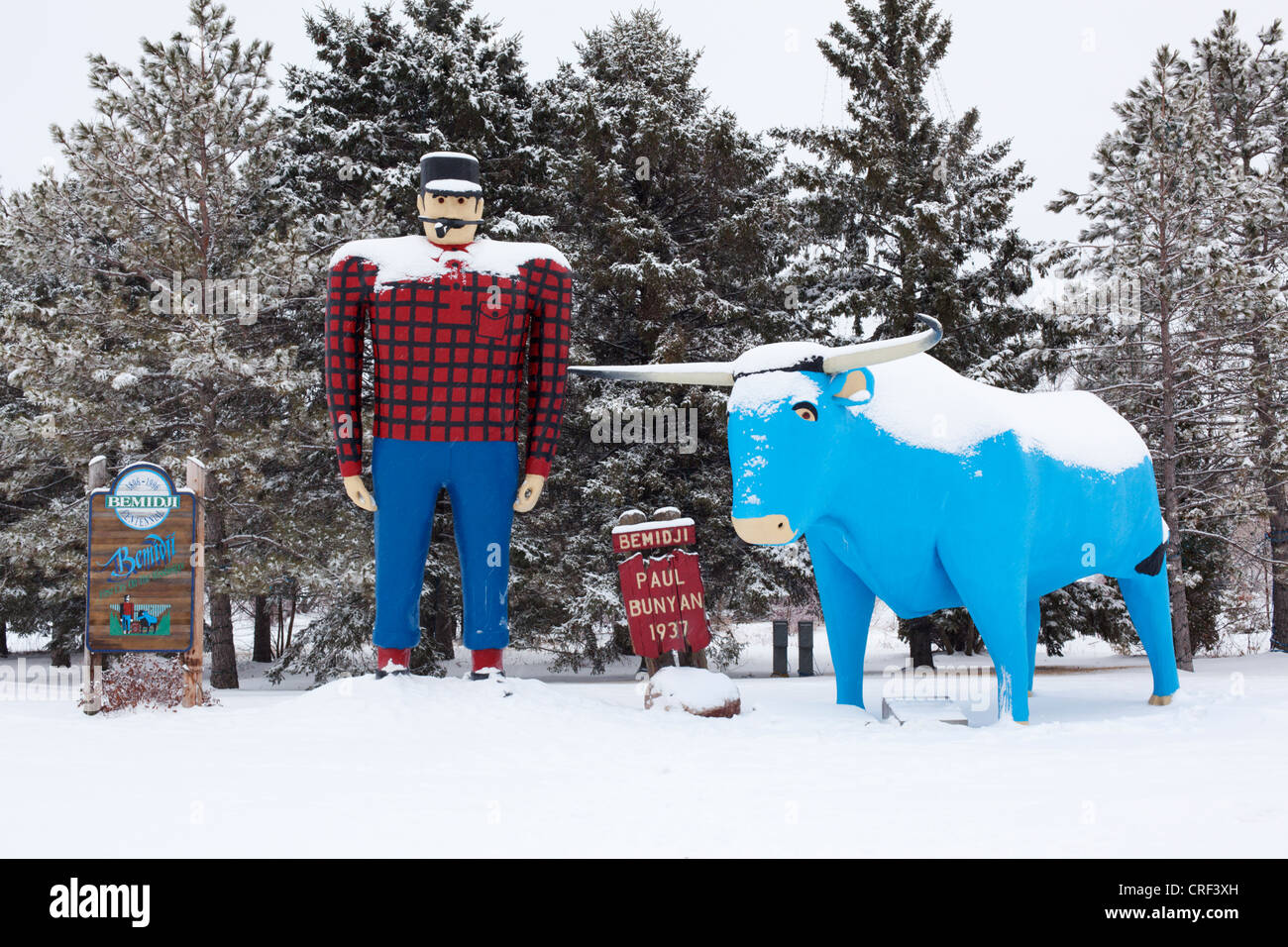 Paul Bunyan lumberjack and Babe the Blue Ox sculpture in winter - Bemidji, Minnesota. Stock Photo