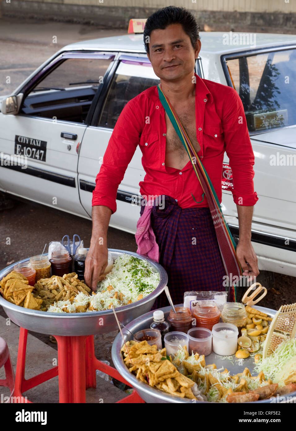 Myanmar, Burma. Yangon Street Food Vendor. Stock Photo