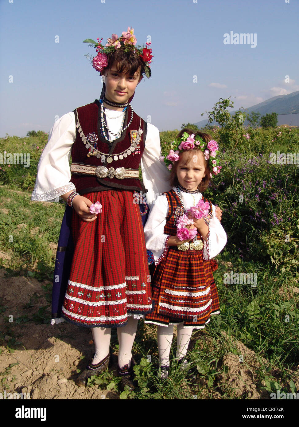 girls in traditional clothes at the rose festival of Karlovo, Bulgaria, Karlovo Stock Photo