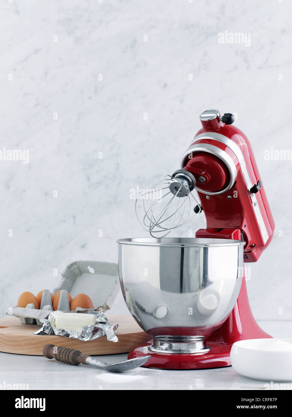 Kitchen mixer with eggs and butter Stock Photo Alamy