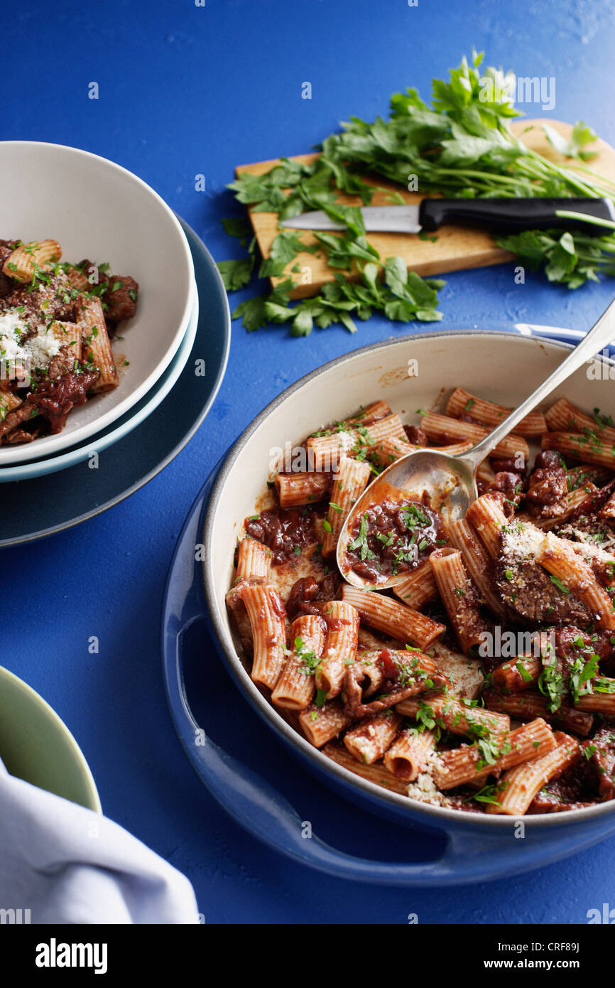Pot of meat rigatoni with herbs Stock Photo