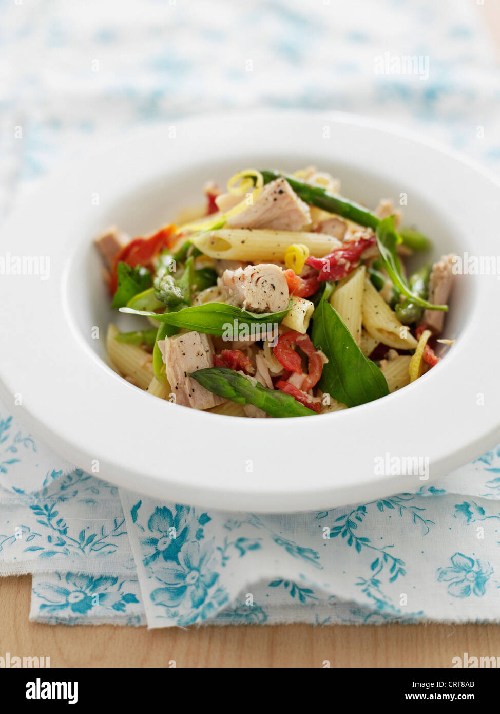 Bowl of carbonara pasta with vegetables Stock Photo