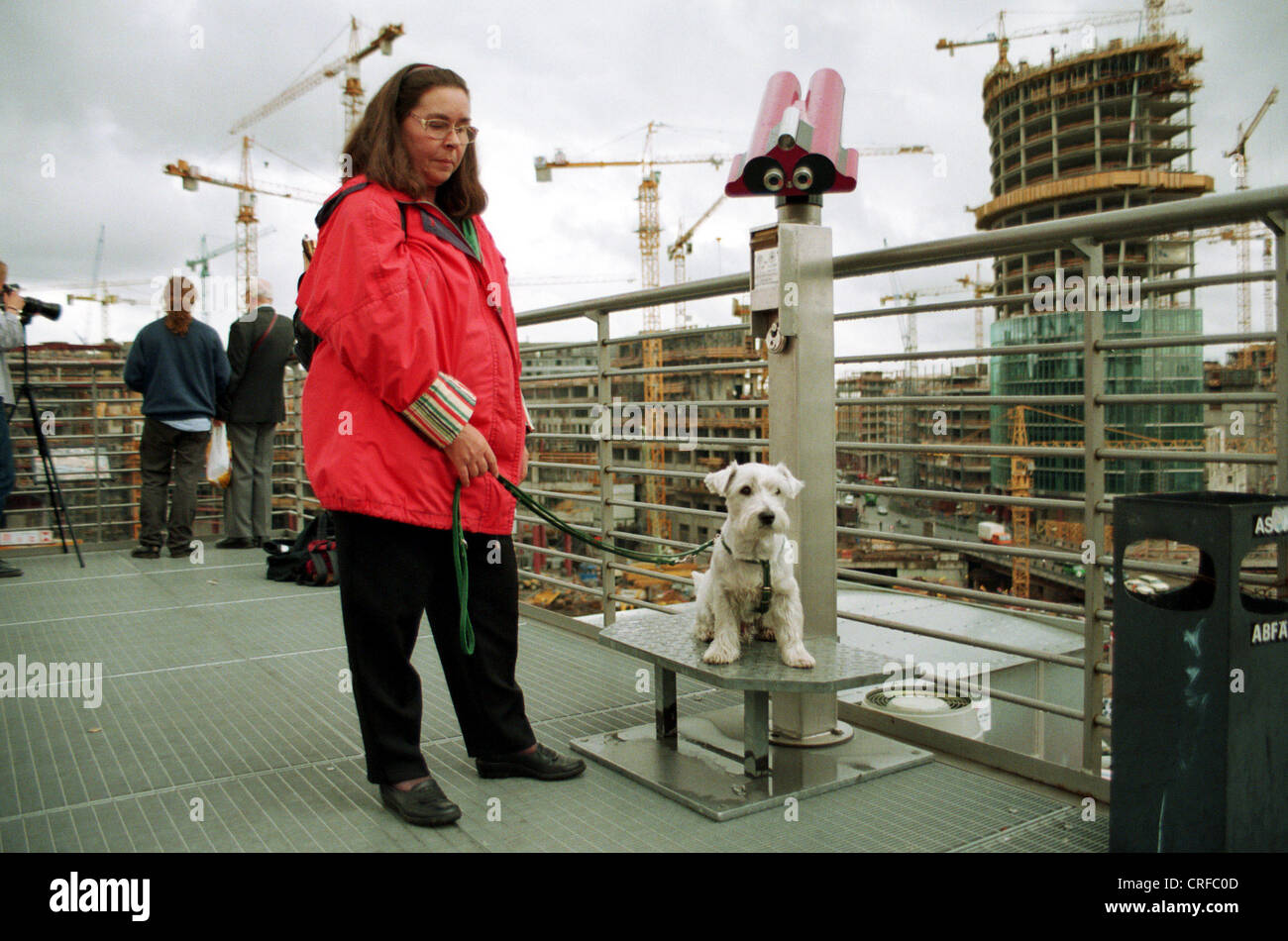 Berlin, Germany, a tourist with a dog on the observation deck of the