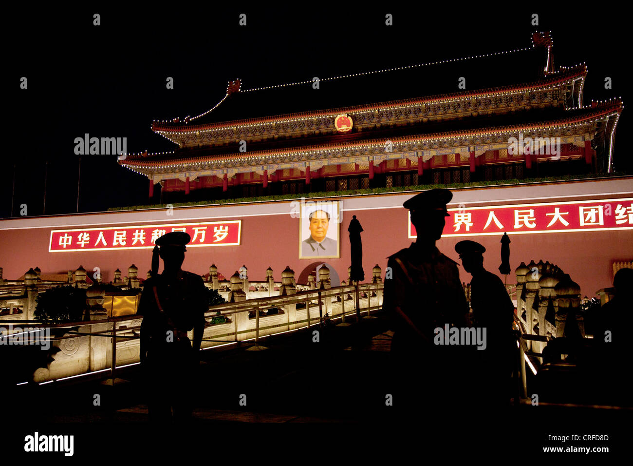 People's Liberation Army PLA soldiers on guard outside the Heavenly Gate of Peace, the entrance to the Forbidden City, Beijing. Stock Photo