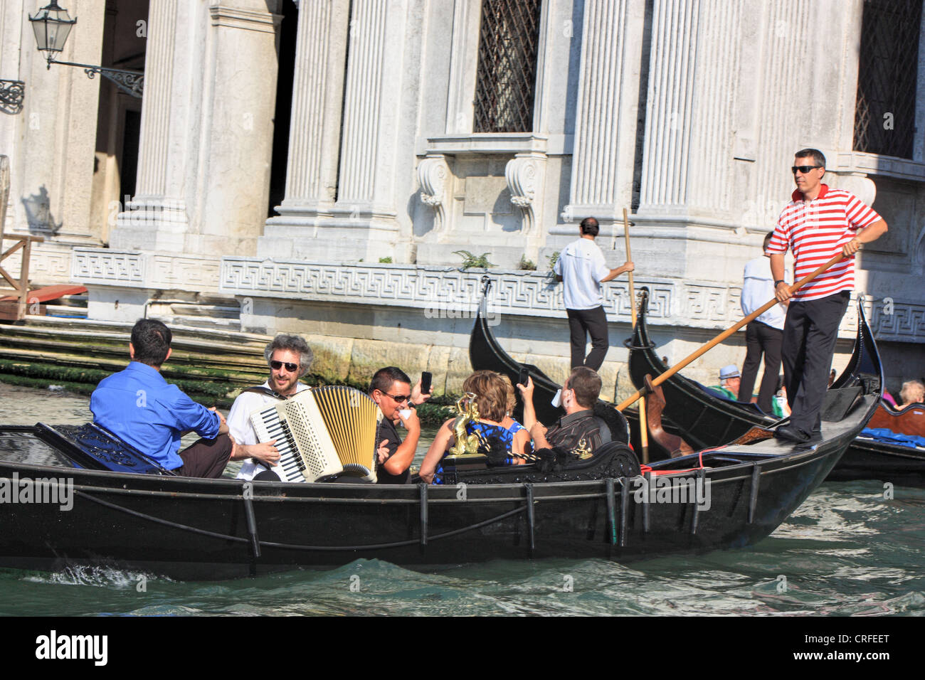 Musician and singer at Gondola Serenade Venice Stock Photo Alamy