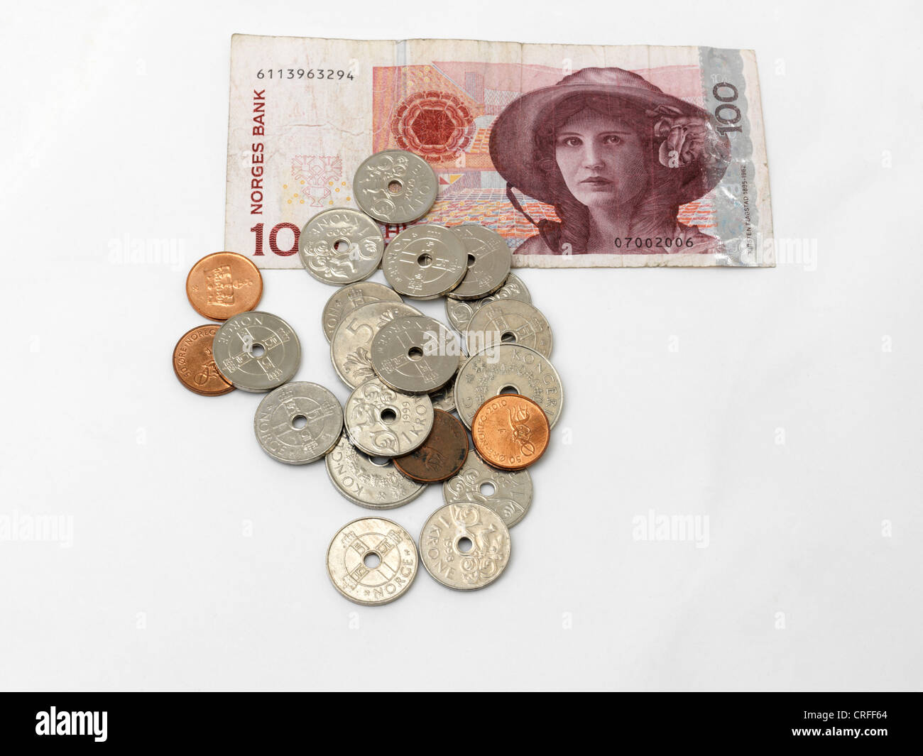 Norwegian Kroner Banknote And Coins - Ore, 1 krone, 5 Krone And 100 kroner Stock Photo