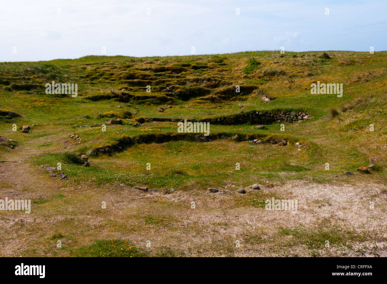 Cladh Hallan roundhouses on the island of South Uist in the Outer Hebrides. Stock Photo