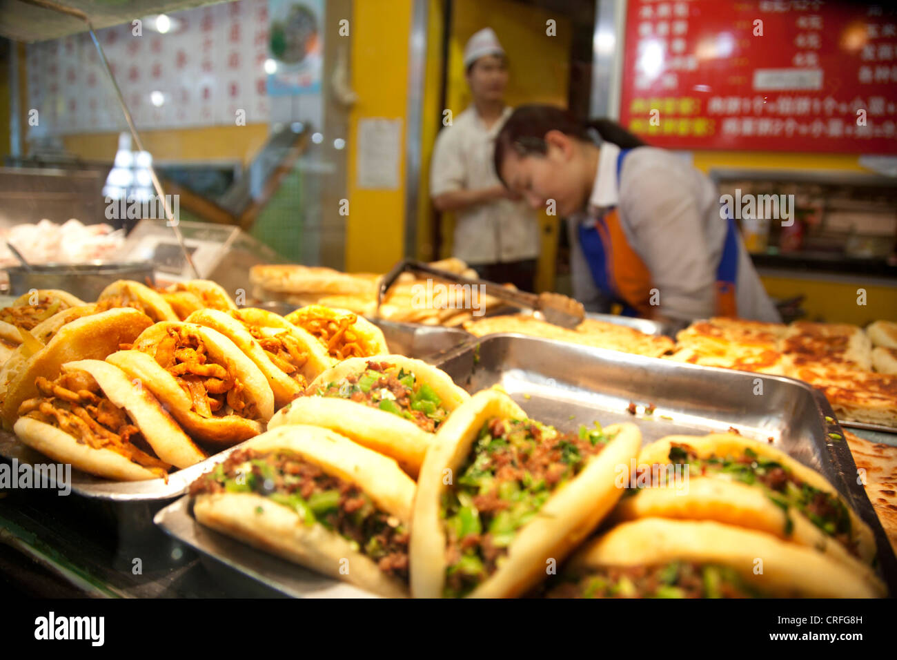 Restaurant workers serving in the canteen food hall of eplaza digital