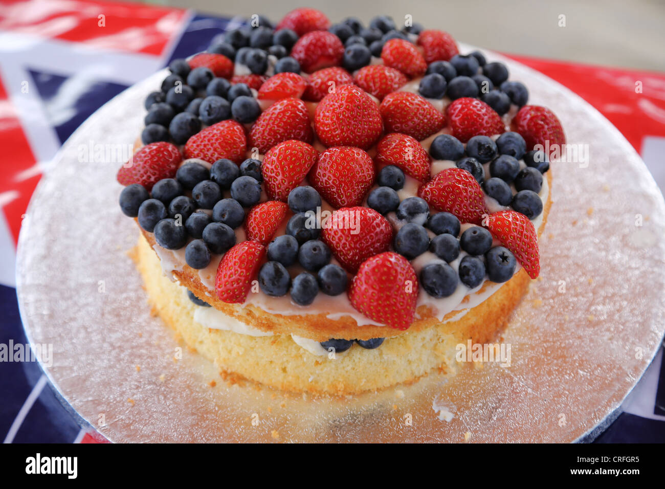 Sponge Cake With Strawberries And Blueberries Decorated To Look Like Union Jack Made For The Queen's Diamond Jubilee Stock Photo