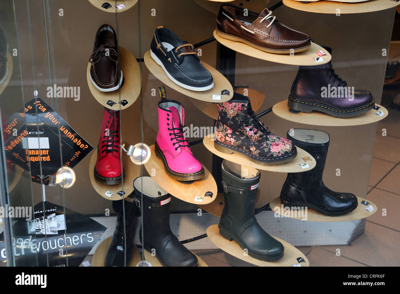 Surrey England Sutton High Street Close Up Of Shoes And Boots In Sole Trader Stock Photo