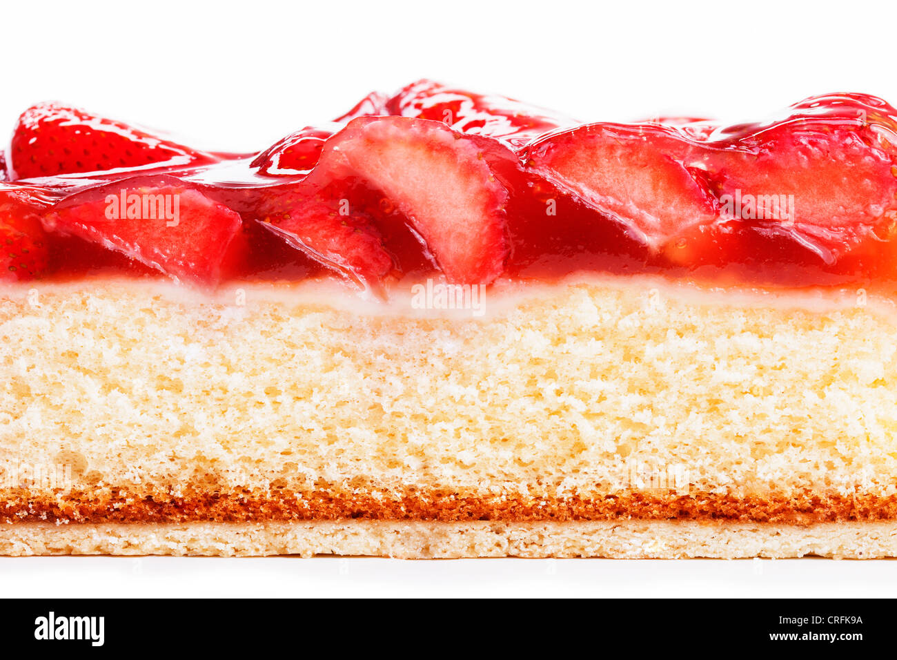 closeup of a strawberry cake from side on white background Stock Photo ...