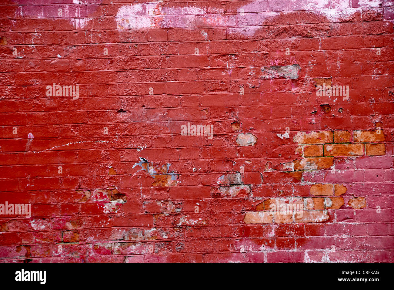 Painted Brick Wall With Paint Peeling Off Stock Photo - Alamy