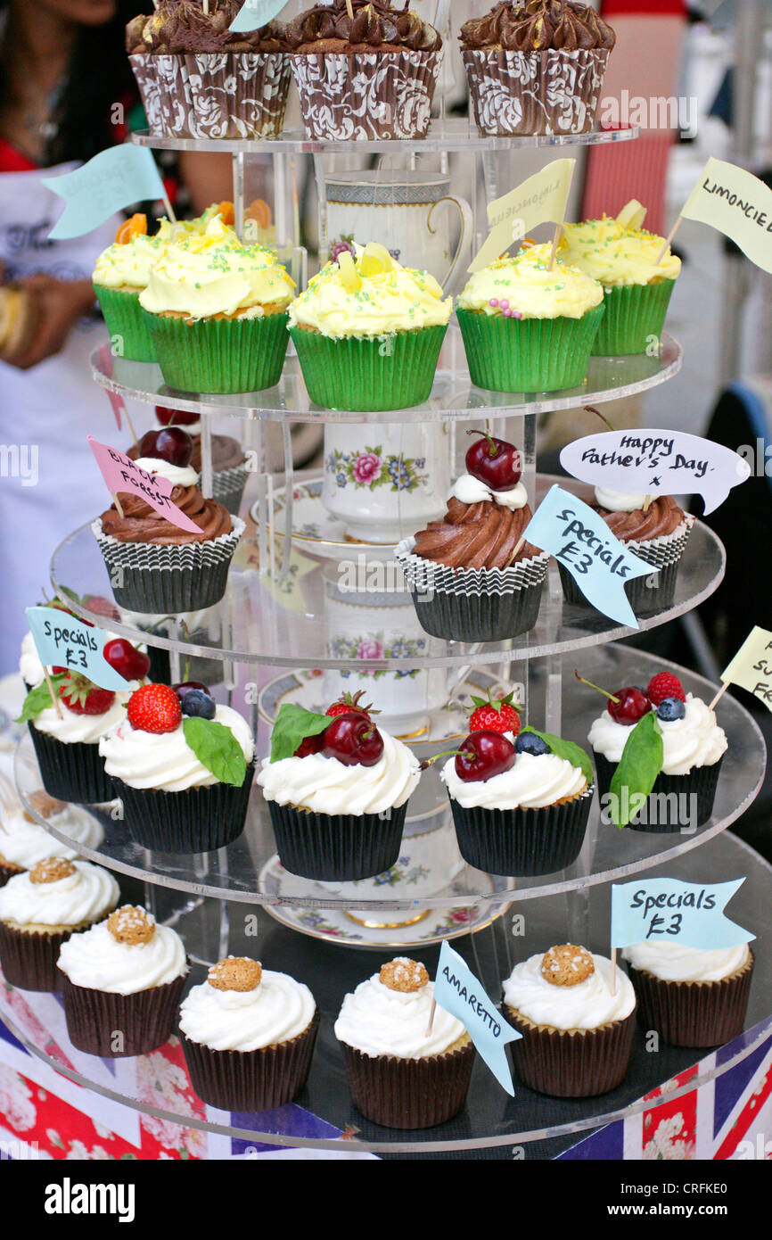 Cupcakes on a cake stand for sale and on display during the Marylebone