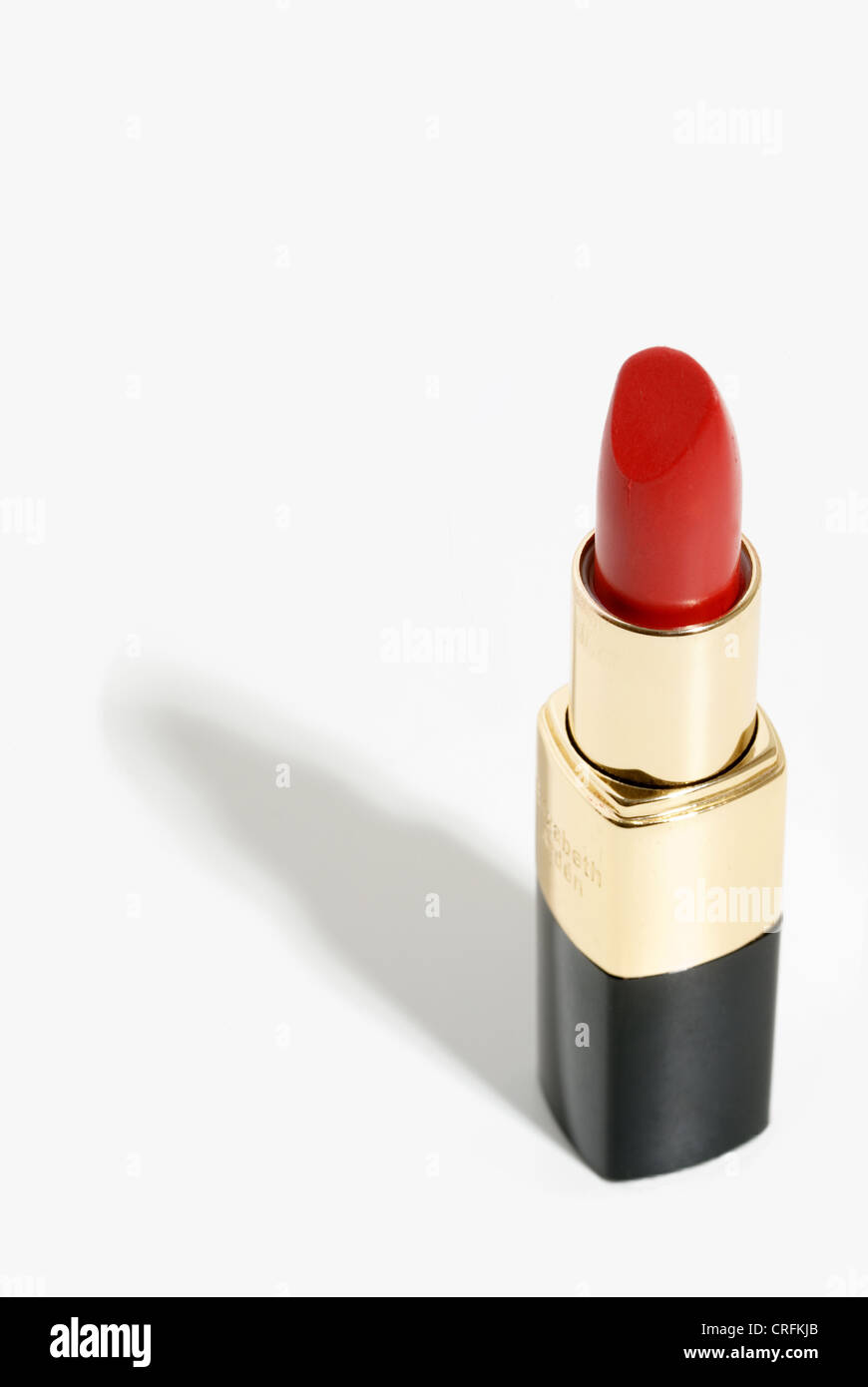 Red Lipstick cosmetic on white background, nobody. Stock Photo