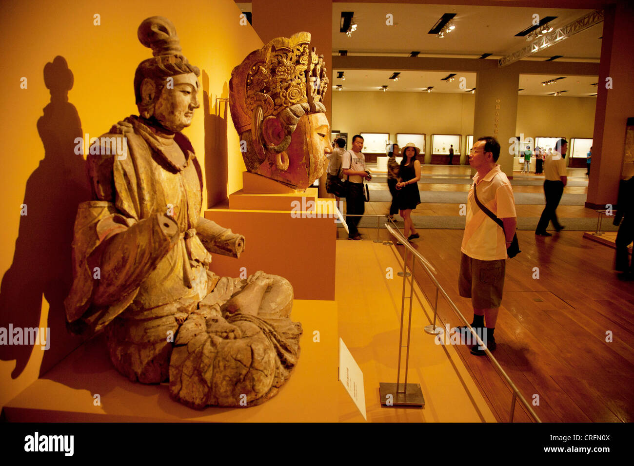 Ancient Chinese art on show in an exhibition at The National Museum of China, Beijing. Stock Photo
