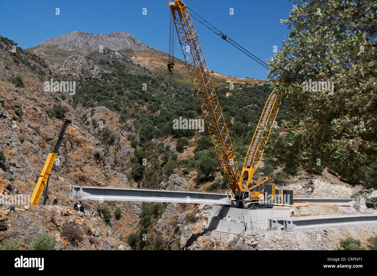 New bridge construction spanning a chasm, Crete, Greece Stock Photo