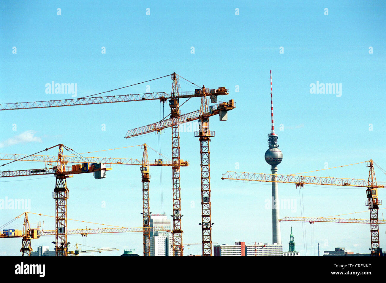 Berlin, Germany, Construction cranes with TV tower Stock Photo Alamy