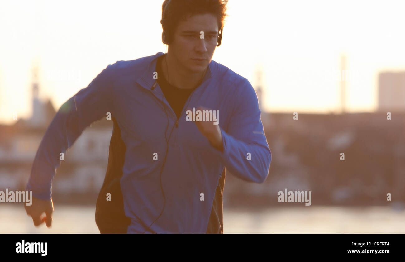 Man running in headphones Stock Photo Alamy