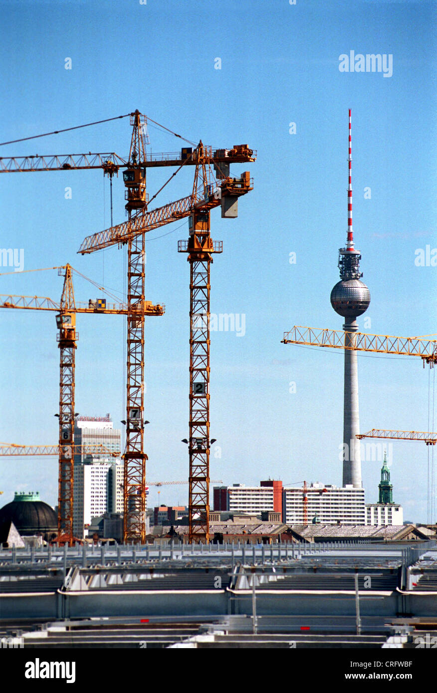 Berlin, Germany, Construction cranes with TV tower Stock Photo Alamy