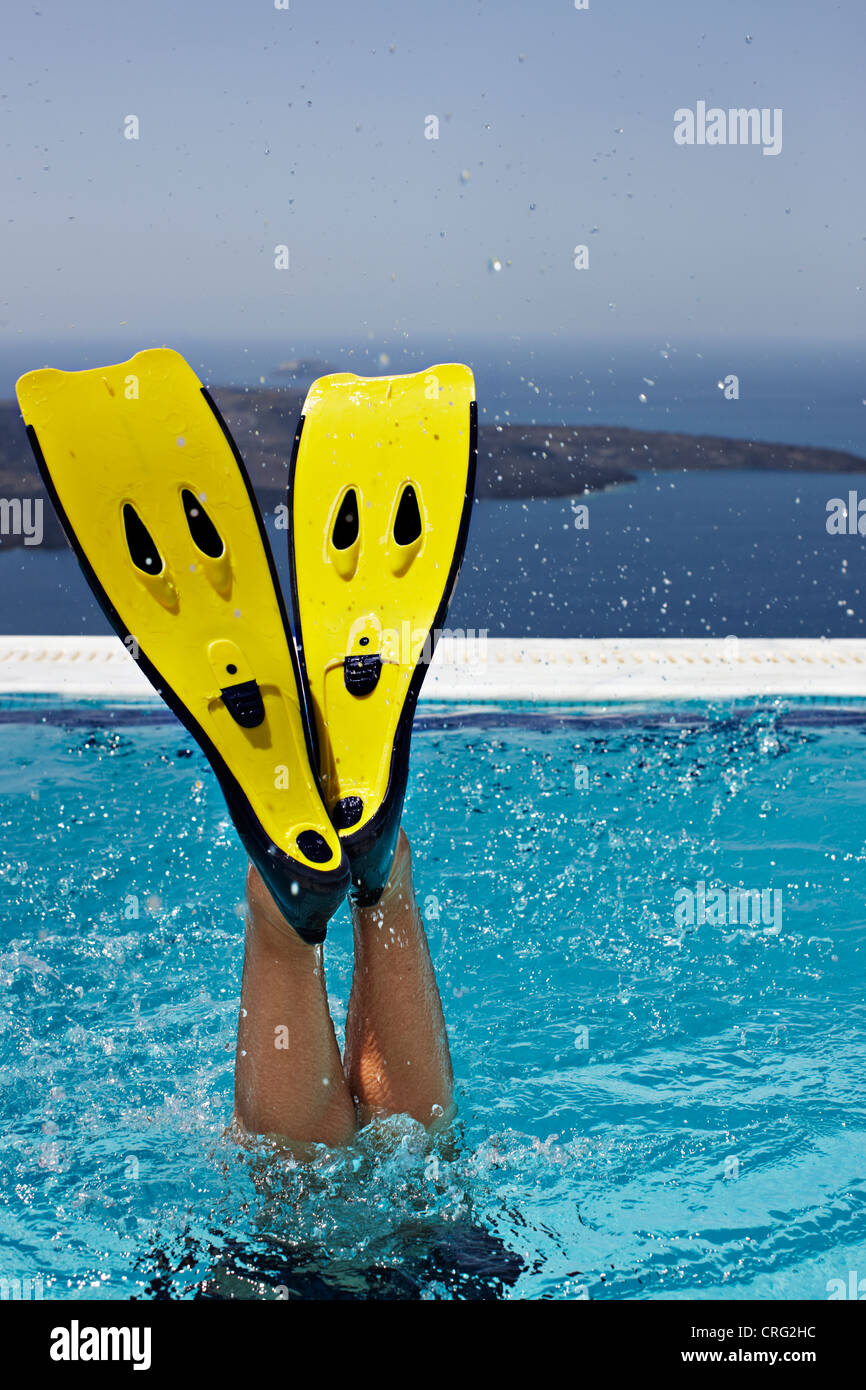 Fins splashing in swimming pool Stock Photo Alamy