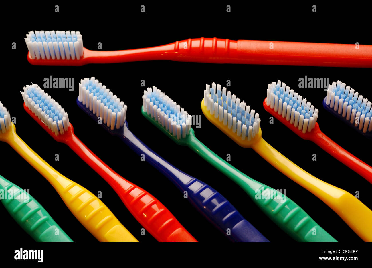 Multicouloured toothbrushes. Stock Photo