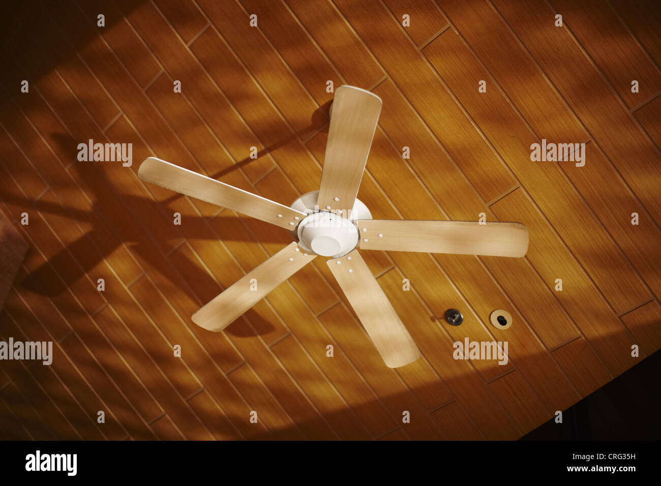 Wooden Ceiling Fan Casting Shadows Stock Photo Alamy