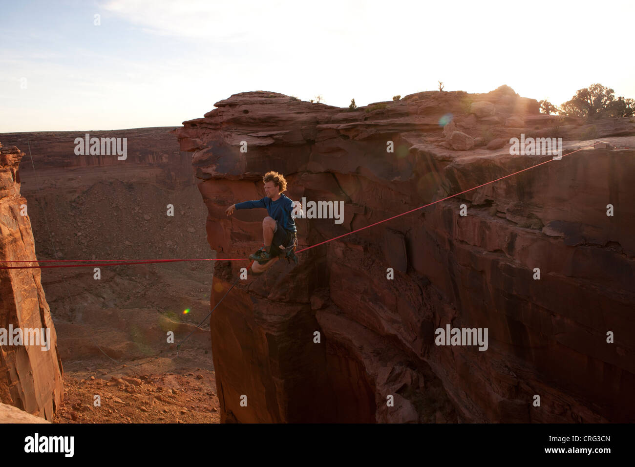 Andy Lewis preparing to cut his highline with a knife in the film