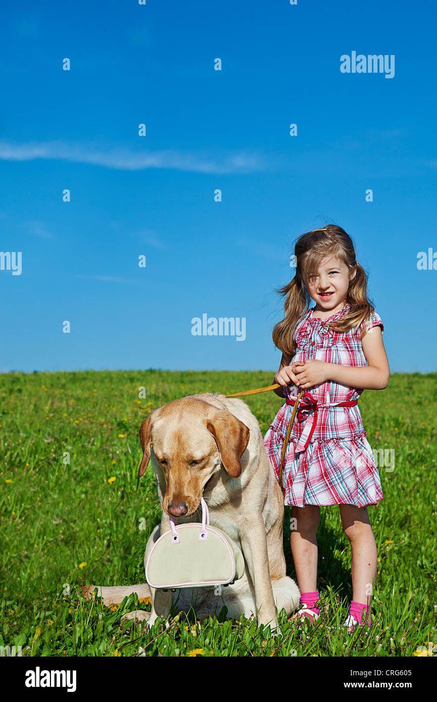 a little girl with her dog Stock Photo - Alamy