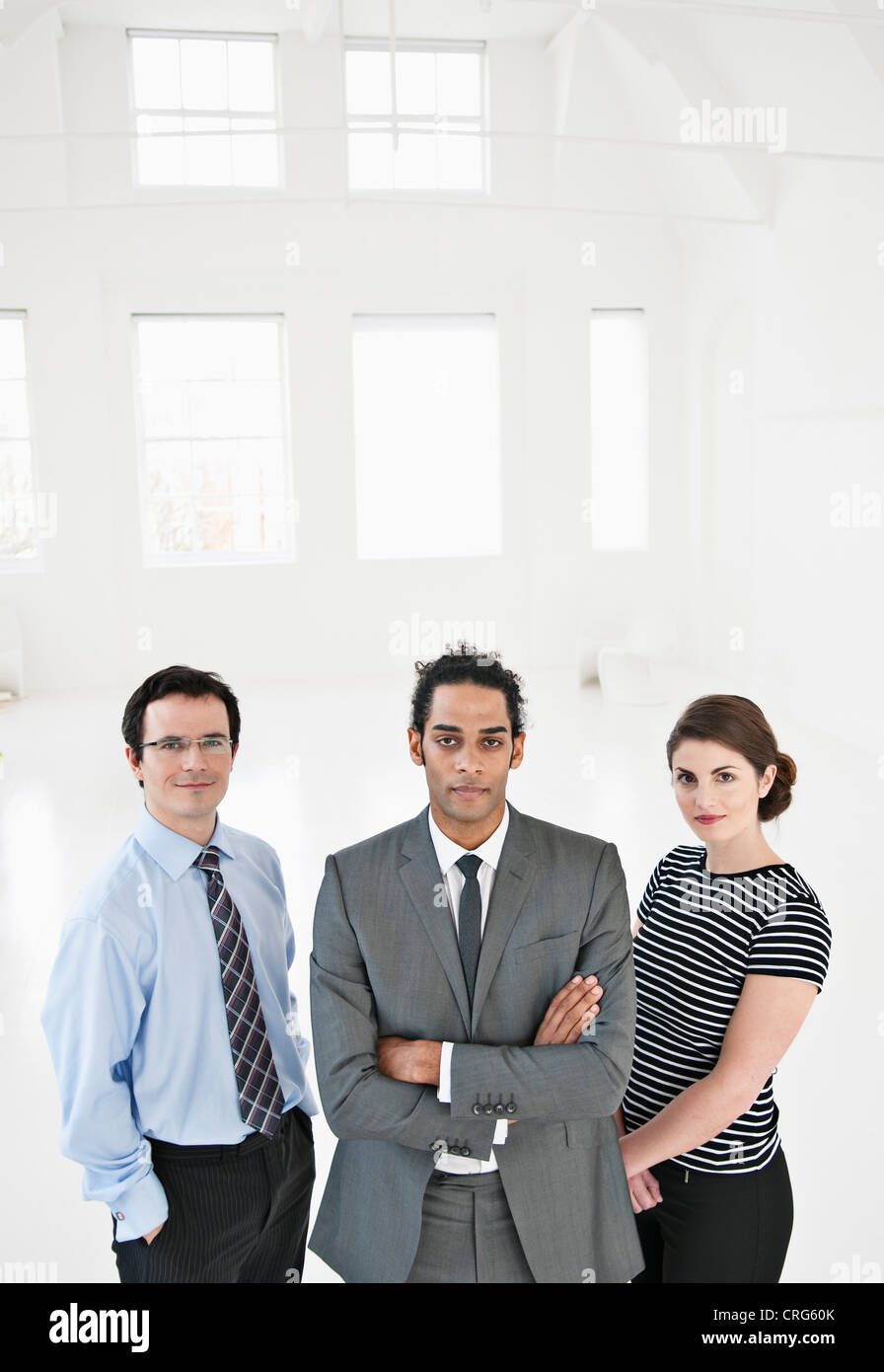 Business people standing in office Stock Photo