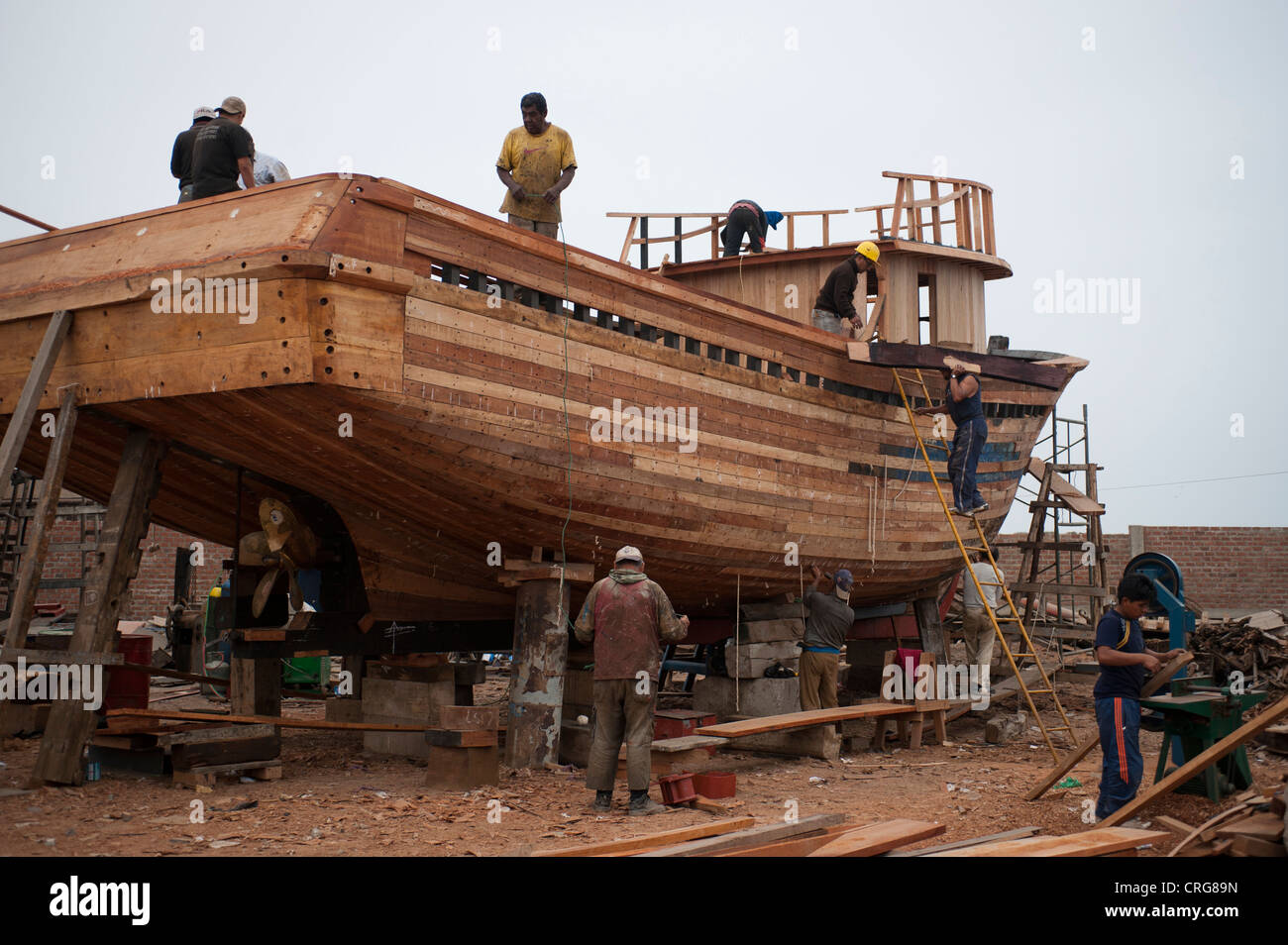 Wood boat building at shipyard in Callao port, Peru Stock Photo