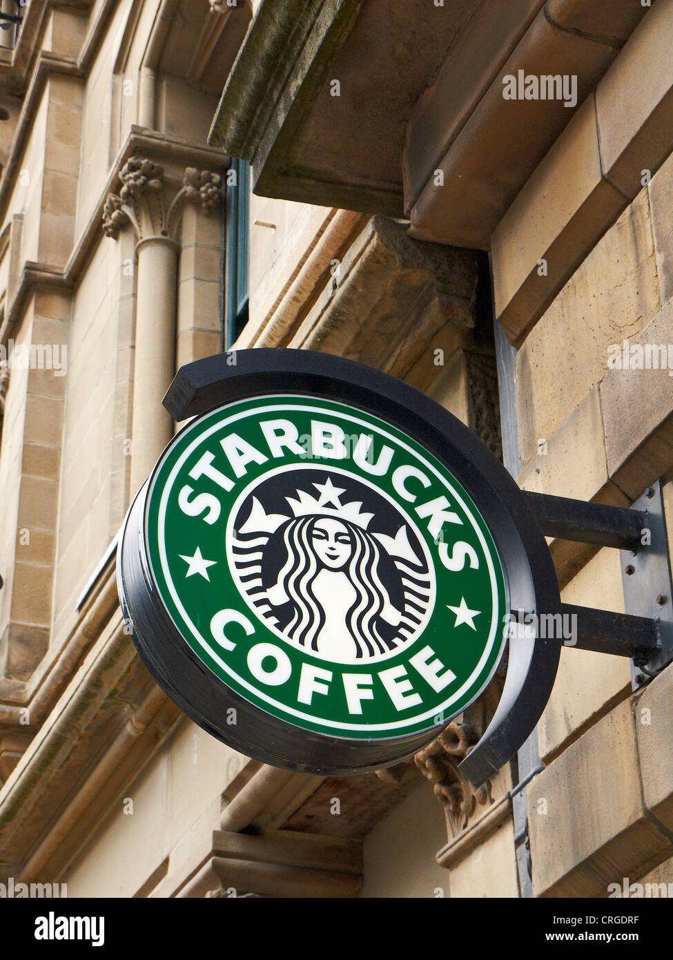 Starbucks coffee sign on outside wall in Manchester UK Stock Photo