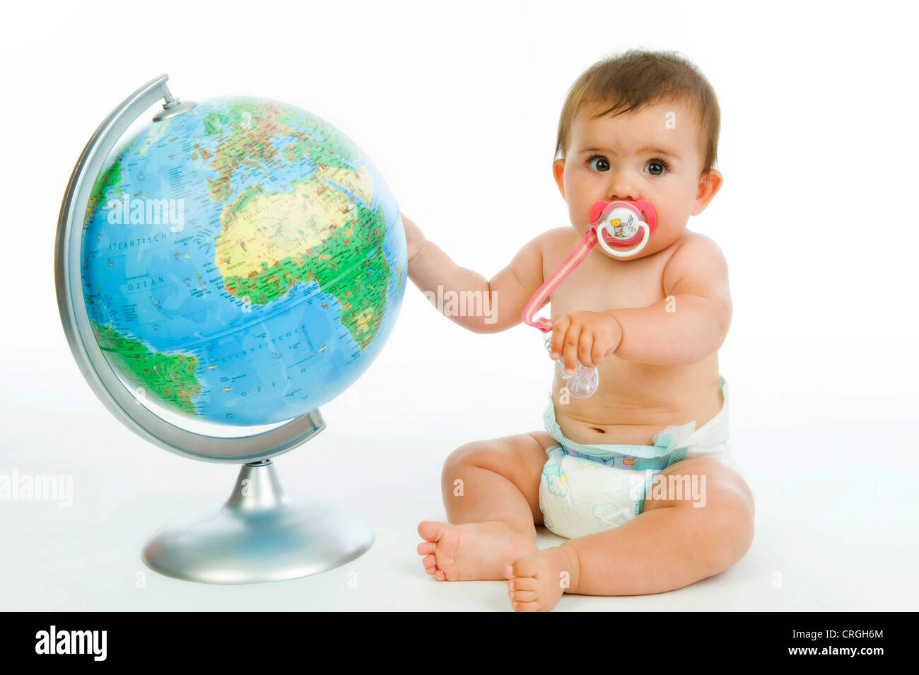 little child with globe Stock Photo