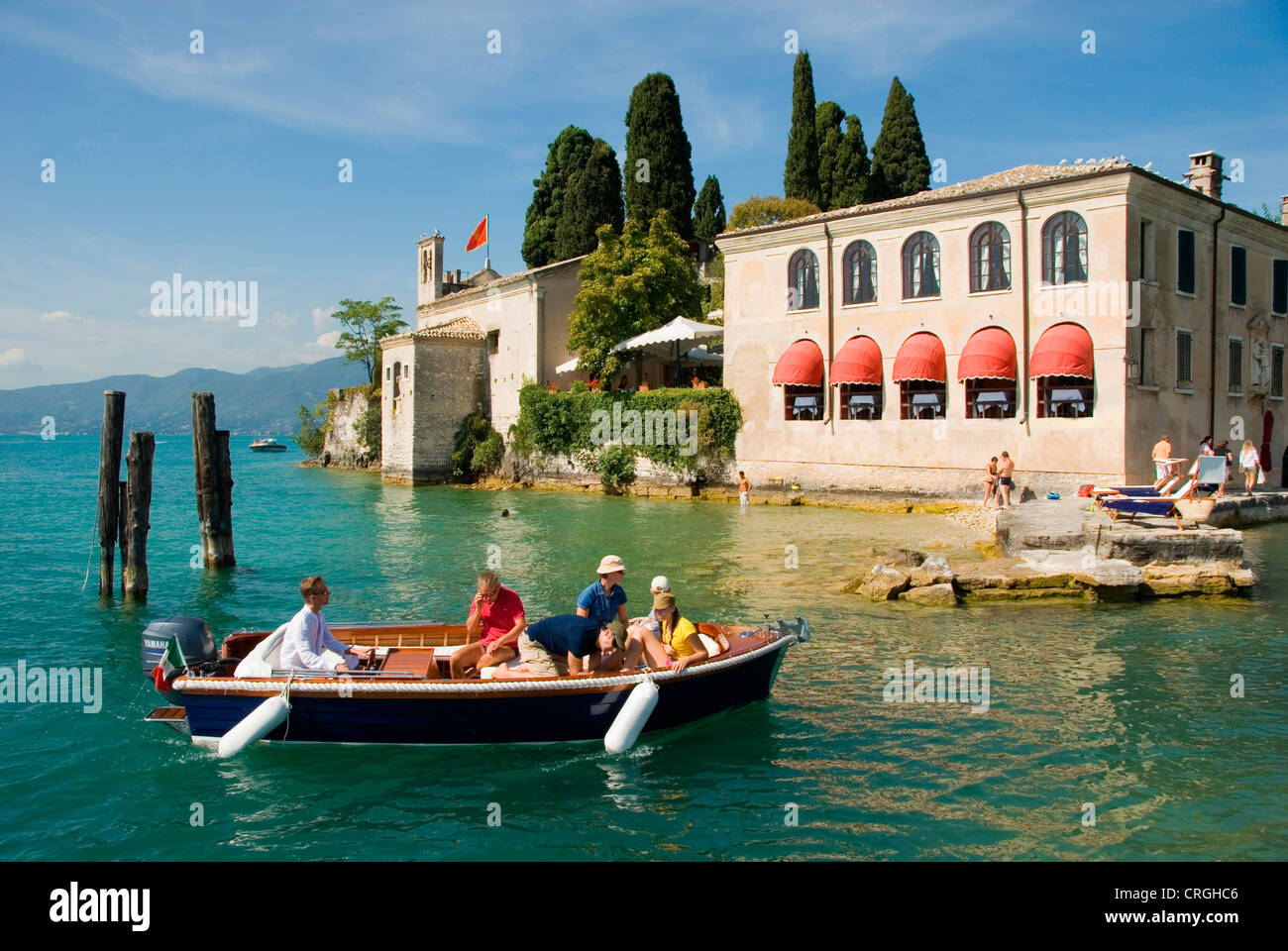 restaurant, Locanda San Vigilio at Lake Garda, family boating, Italy, Veneto, Lake Garda, Garda Stock Photo