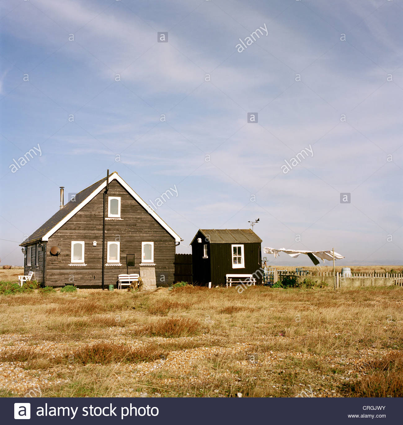 Remote Clapboard House In Dungeness In Kent Uk Stock Photo