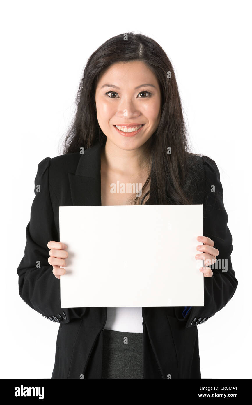 Asian Business woman holding an empty white sign. Stock Photo