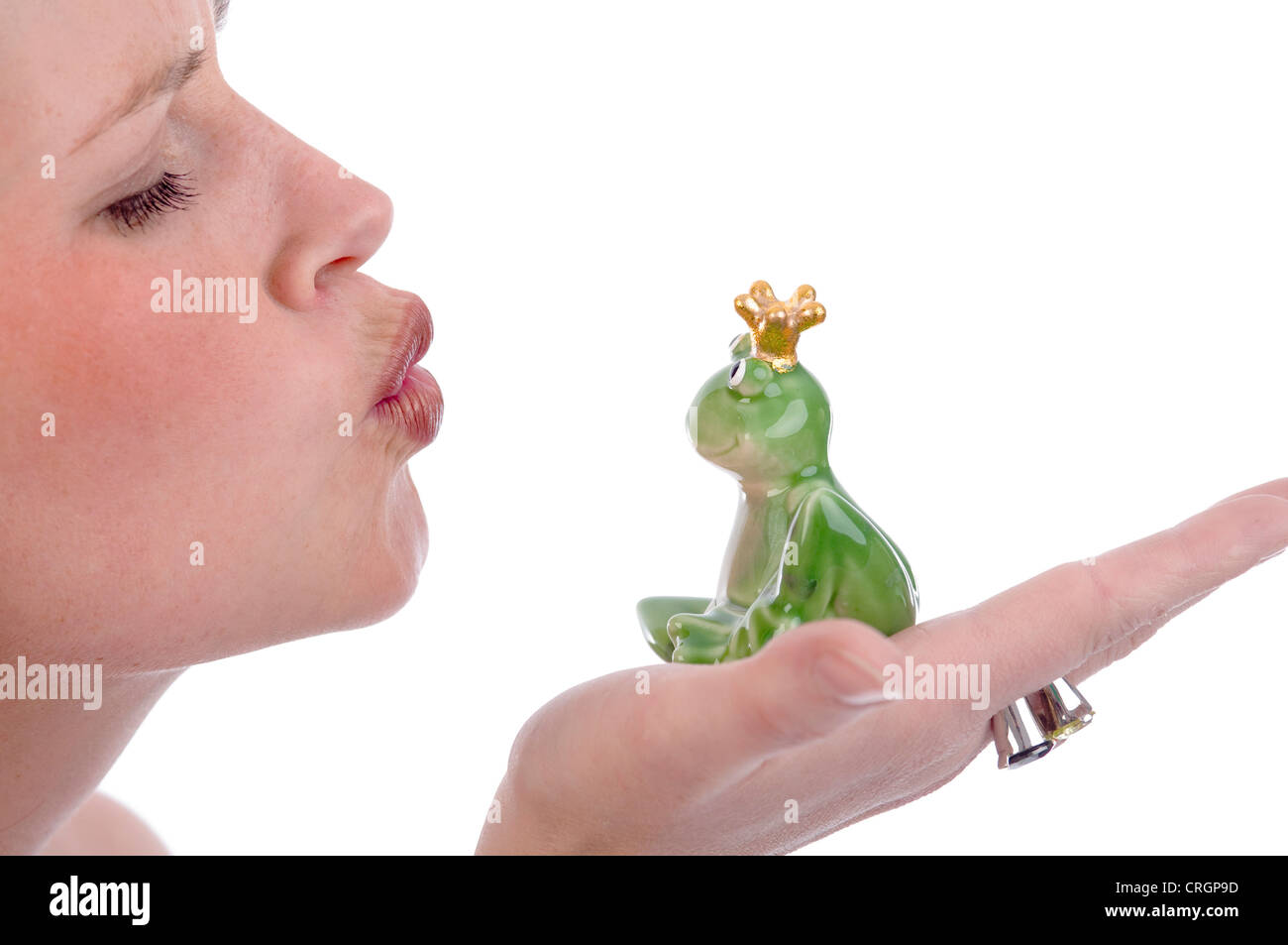 woman kissing Frog King Stock Photo