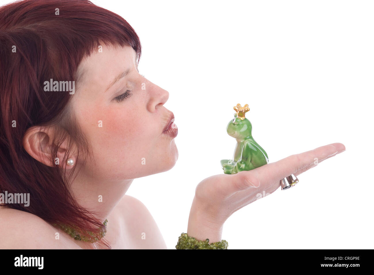 woman kissing Frog King Stock Photo