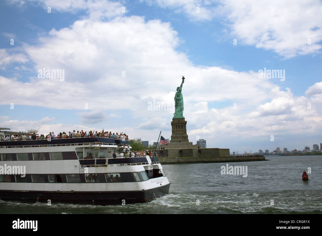 passenger ship in front of the Statue of Liberty, USA, New York City