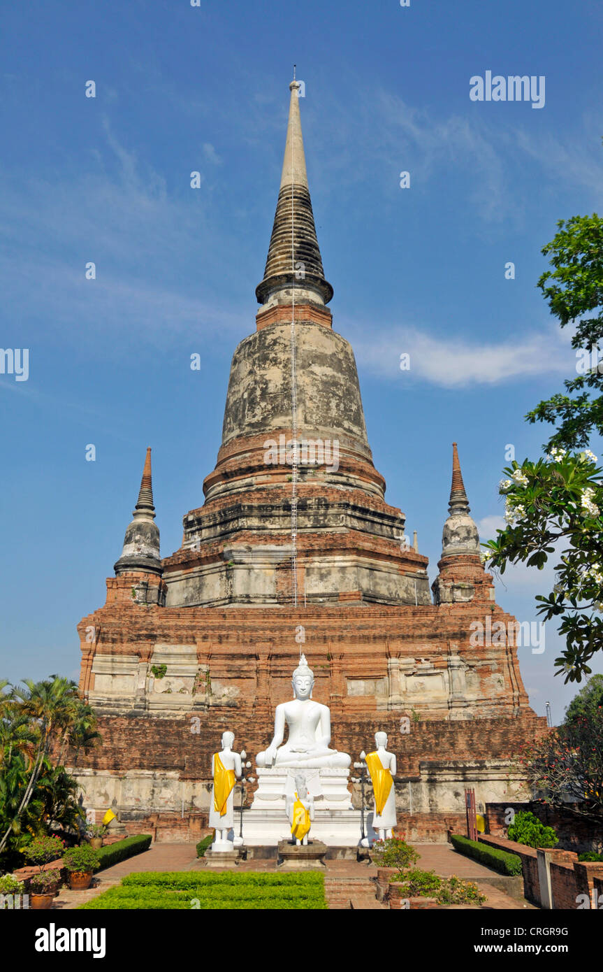 buddha statues in front of teh Great Chedi Chaya Mongkol, Thailand, Ayutthaya, Wat Yai Chai Mongkon Stock Photo