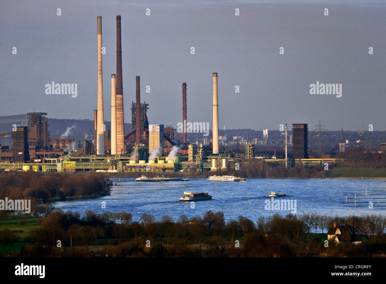 view from stockpile Rheinpreussen on the Rhine and Thyssen Krupp steel industry Bruckhausen, Germany, North Rhine-Westphalia, Ruhr Area, Duisburg Stock Photo