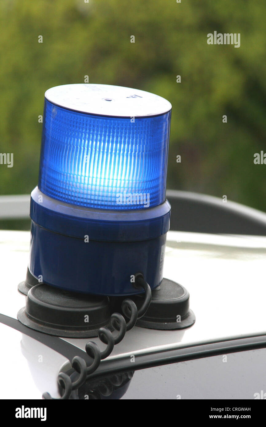 removable flashing blue light on a car roof Stock Photo Alamy