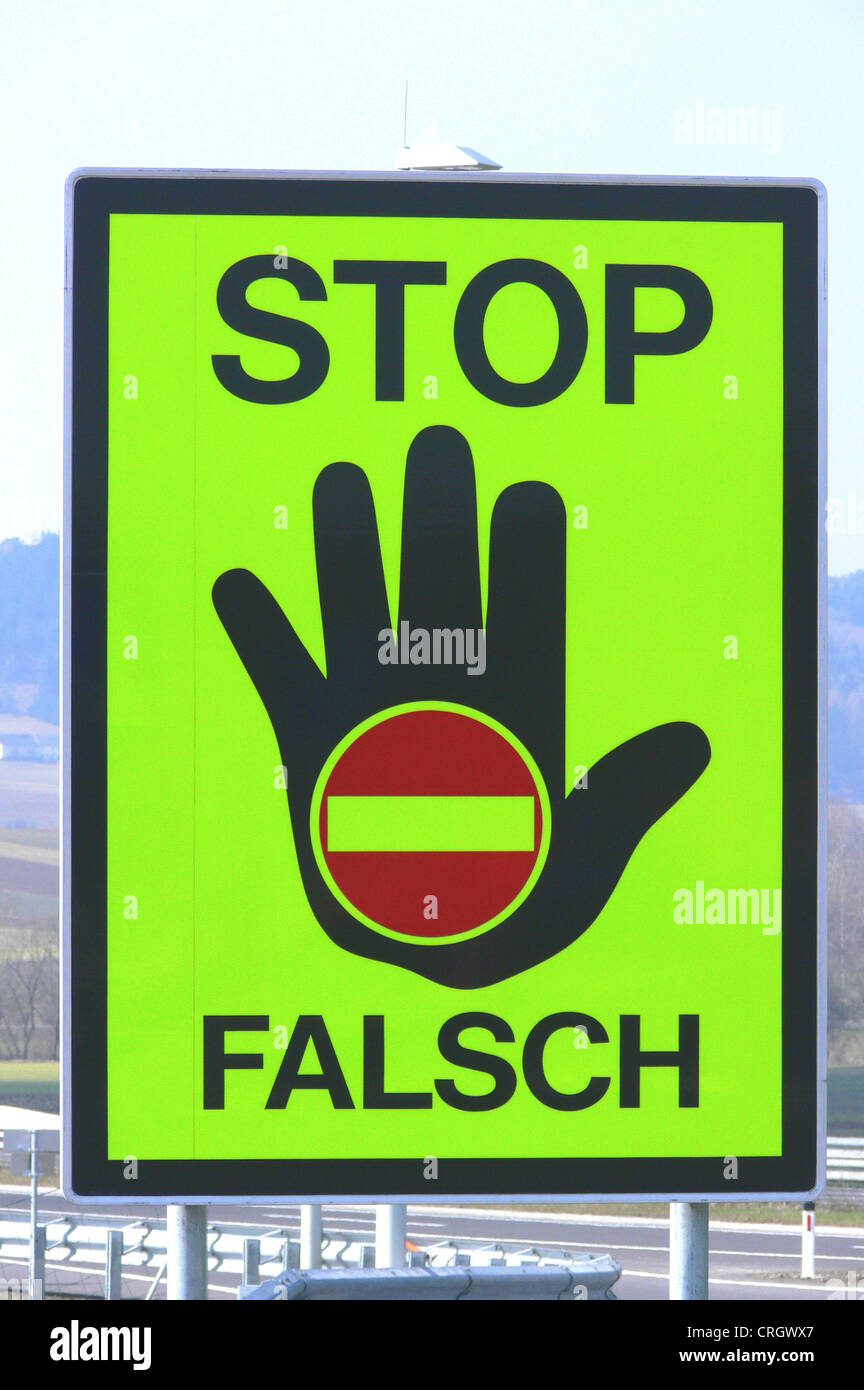 caution wrong direction Stock Photo - Alamy