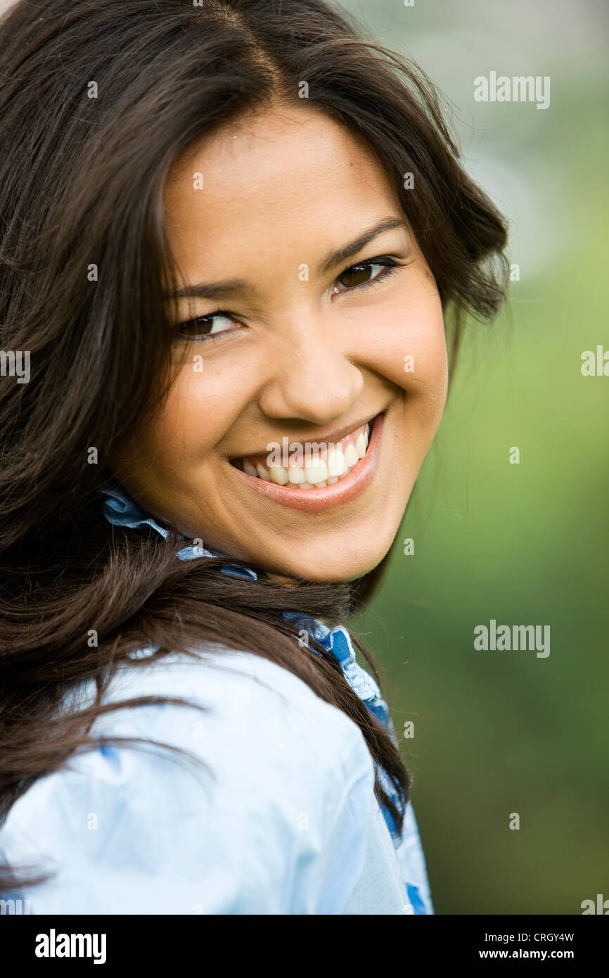 young attractive brown-haired woman smiling Stock Photo