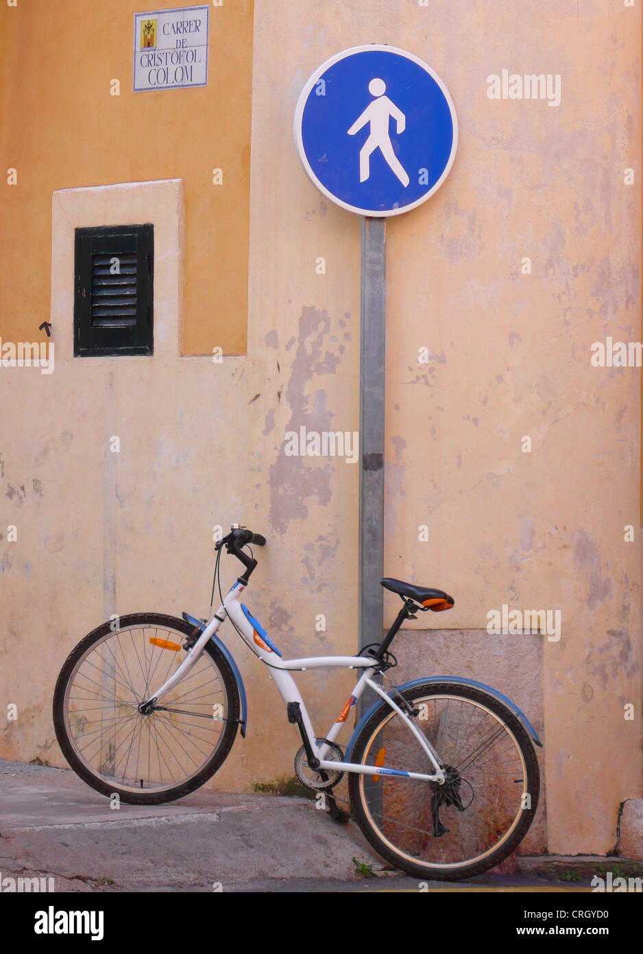 bike chained at a footway sign, Spain, Balearen, Majorca, Alcudia Stock Photo