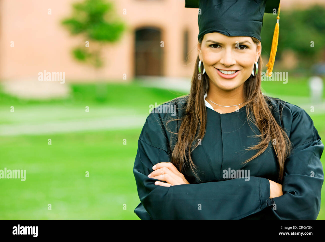 smiling beautiful woman during her graduation at university Stock Photo